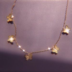 Gold butterfly necklace